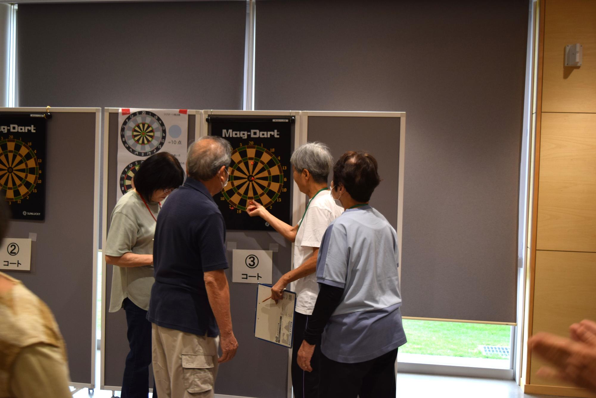 ダーツの得点を数える様子